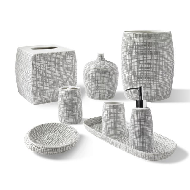 Crafted from embossed porcelain and inspired to reflect woven raffia palms, this accessory set adds a feeling of natural...