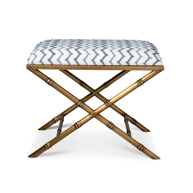 Classic detail of bamboo is featured on the Lauderdale upholstered bench. Cast steel metal frames are available in aged...