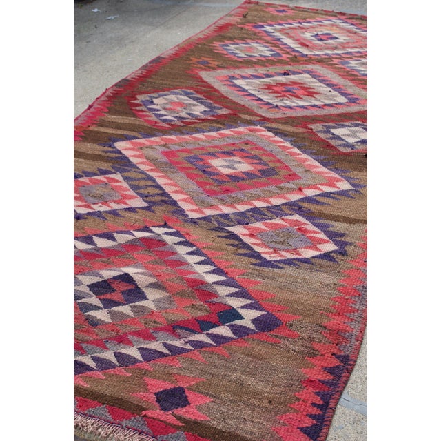 Name: Kelly Size: 5 x 10.7 Age: Vintage. Some wear and color run throughout. Please see in photos. Pile: Low. Overall very...