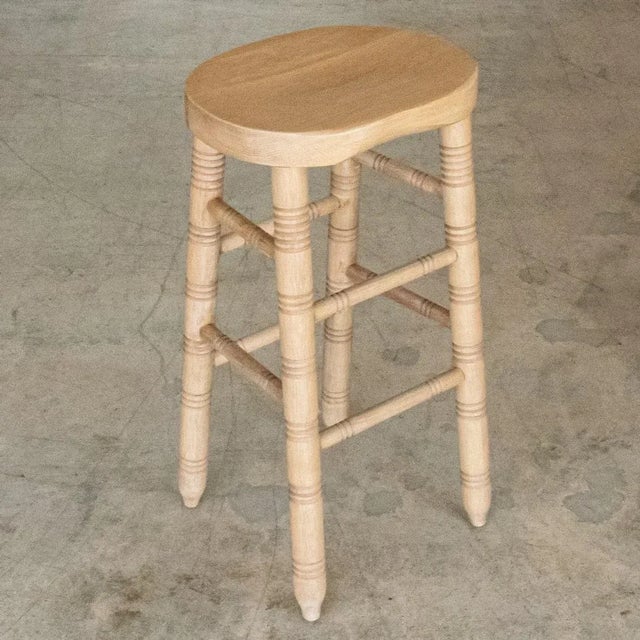New solid white oak bar stool with hand carved seat and carved ribbed detailing. Sold individually. Measures 16.25" W x...