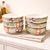 A beautiful set of vintage Arita porcelain Imari rice bowls featuring the classic Japanese floral vase panel motif in iron...