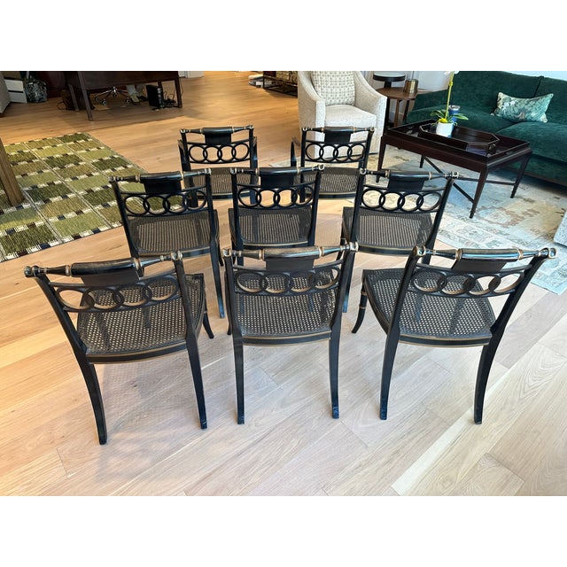 A set of 8 "Governor Alston" Regency style dining chairs from the Baker Historic Charleston Collection. Set includes 6...