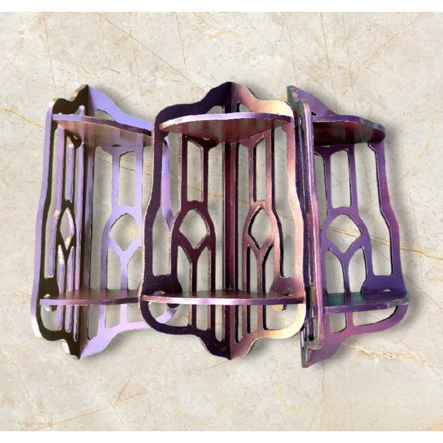 A beautiful set of 3 dark painted wood fretwork corner display shelves. The shelves have such pretty delicate fretwork...