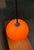Rare train pendant lamp from Guzzini. The large plastic shade is designed in orange. The screen is white on the inside....