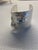 silver evil eye wide cuff bracelet with sculptured nose and eye.2 1/2" wide , 6 1/4" opening