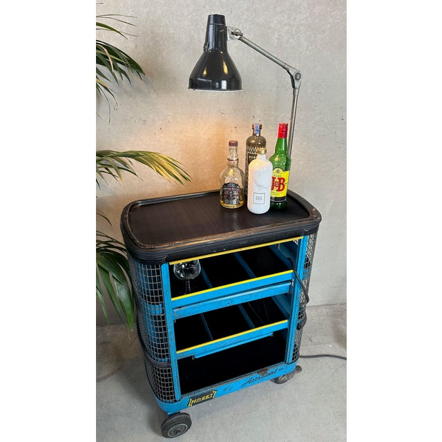 Robust 1960s industrial trolley by Hazet. Model: Assistent 171. Fully functional roller shutter. 2 drawers. Presented here...