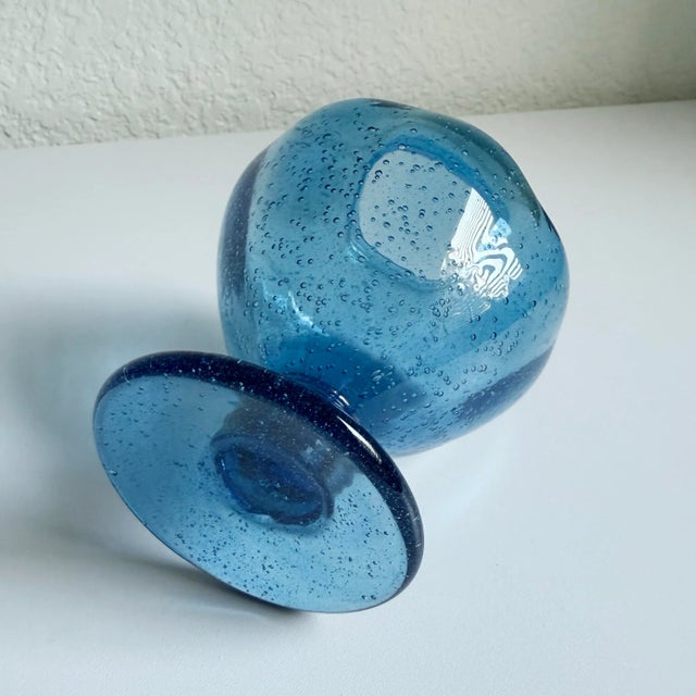 Small, French-made bubble glass footed bud vase handblown by a master glassmaker in Biot, France, using traditional...