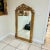 This French style gold floral floor mirror is a luxurious statement piece that combines exquisite craftsmanship with...
