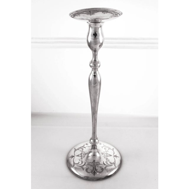 An exceptional pair of sterling silver candlesticks by Shreve Crump and Low of San Francisco. Delicate etching can be...