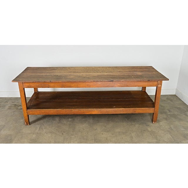 A French, 18th century work table in two tiers, formerly a drapery table where large window treatments could be assembled...