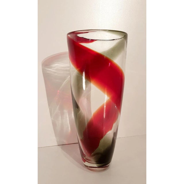 This multi-layered blown Murano glass vase was designed by Alfredo Barbini. This piece is attributed to the mentioned...