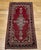 2’ 6” x 4’ 10” Vintage Persian Kashan area rug in a classic medallion floral pattern from the mid 1900s. The rug comes in...