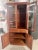 Vintage Danish teak corner China cabinet by Skovby. One piece unit with lighted display area at top. A single light at top...