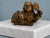 An unusual 19th-century bronze figure distinguished by a particularly charming mechanical detail: a separately constructed...