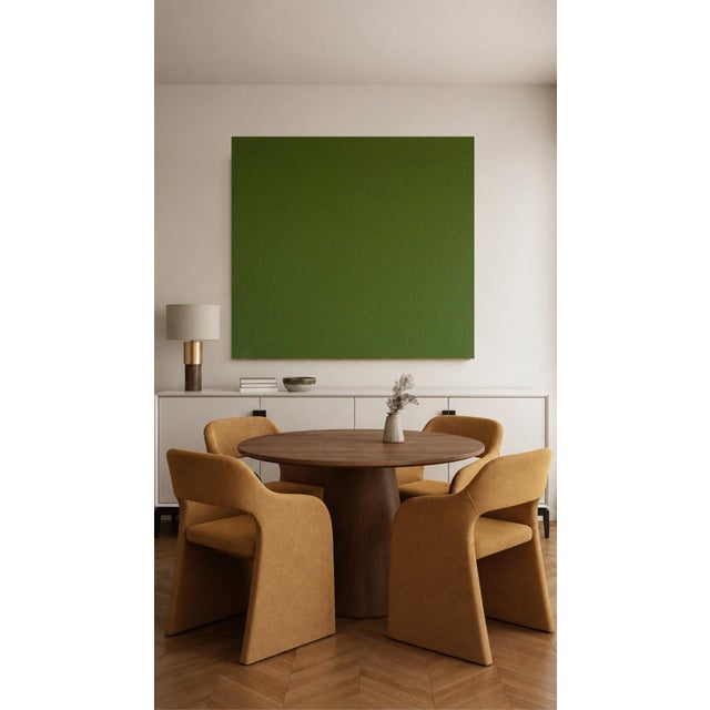 A true study of depth, silence, and color, this monochrome green canvas explores the quiet power of a single hue. Its...