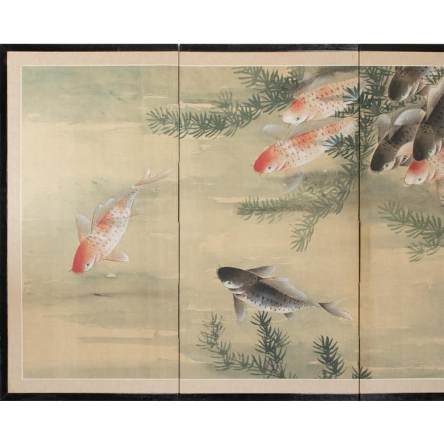 Lovely Chinese 4-panel folding painted silk screen, depicting Koi Fish (Carps) in a pond. Signed and sealed by artist....