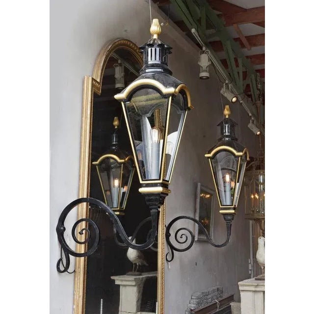 Set wall lanterns model Amsterdam. The Amsterdam is an exact replica of an eighteenth-century oil lantern with pediment...
