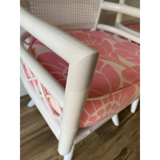 Vintage White Bamboo Swivel Chairs With Floral Pink Seat Cushions a