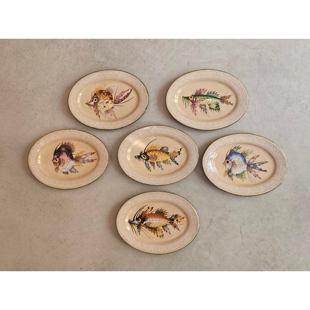 A charming and highly decorative set of six italian ceramic fish plates produced in the 1950s by map – maioliche...