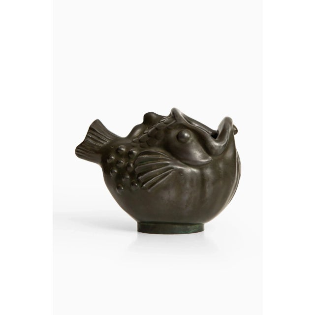 Rare carp fish sculpture by Just Andersen. Produced by Just Andersen in Denmark. This piece is attributed to the mentioned...