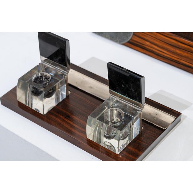 A large, period French Art Deco writing set, crafted from Macassar ebony. It includes a writing surface, a three-...