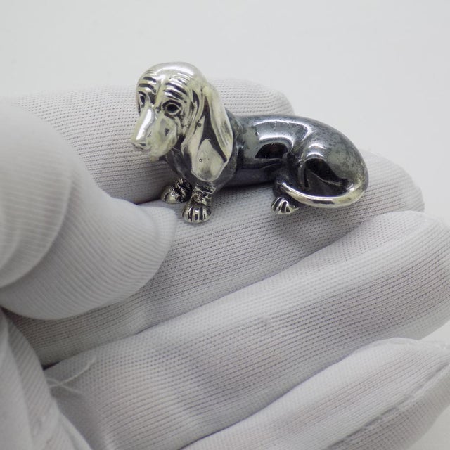 Vintage miniature sculpture with irresistible character depicting a Dachshund “wiener dog”, signed Saturno and handmade in...
