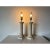 A pair of striking 1980s Vintage Postmodern table lamps crafted in faux-coralstone plaster. Each lamp features a column-...