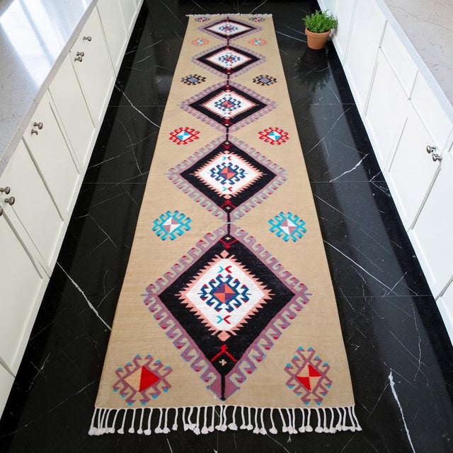 This exceptional silk-on-silk runner, originating from the Aegean region of Turkey, showcases a contemporary...