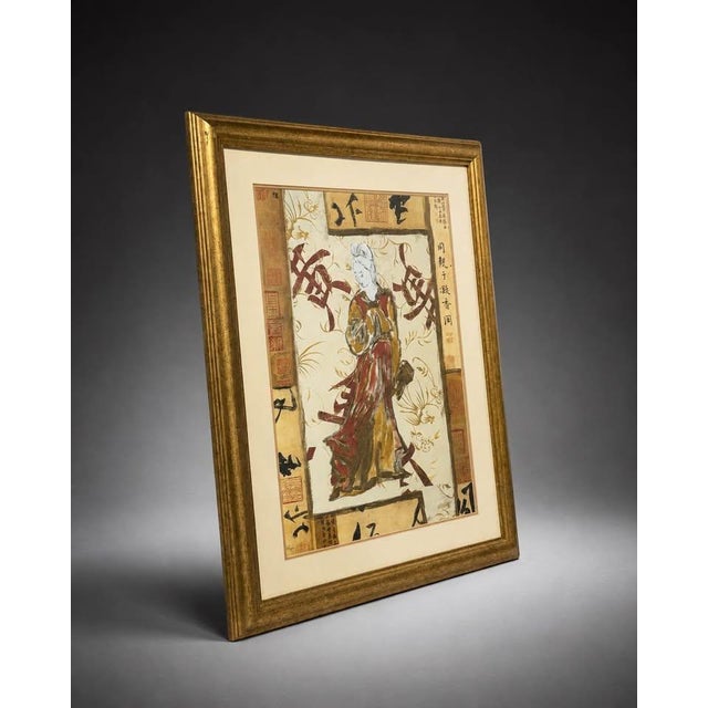 Decorative Asian-inspired framed artwork featuring a traditional figure with calligraphy-style background details and warm...