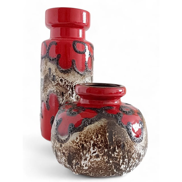 This cheerful beyond cool set of ceramic vases, designed by Oswald Kleudgen for Sheurich Keramik, showcases the iconic Fat...