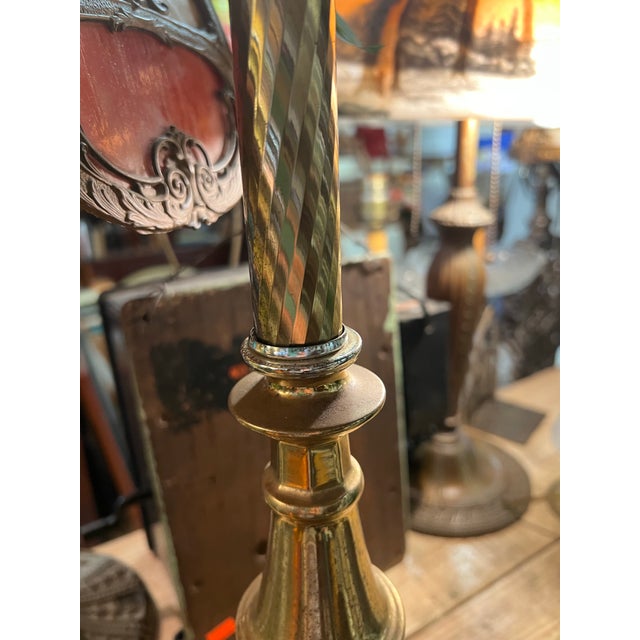 Mid-Century Modern brass floor lamp featuring an integrated octagon-shaped glass table. The table measures 22.5 “ from the...