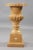 Decorative marble cratervase in the style of classicism Natural marble in golden yellow. Quadrilateral going into curly...