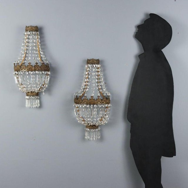 A pair of hot air balloon sconces made in Italy in the late 19th century. The sheet metal structure is decorated with...