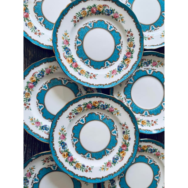 A beautiful set of nine vintage Crown Staffordshire fine bone china bread plates in the Lyric Tunis Blue pattern, made in...