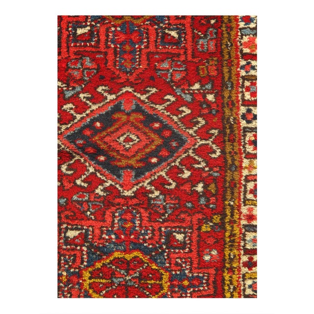 The graceful lines and beautiful rug colors of this antique Persian Heriz Serapi rug evoke the feeling of strolling...