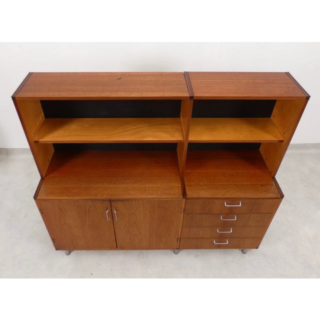 Cabinet from the Made to Measure series designed by Cees Braakman for UMS Pastoe (Netherlands) in the 1950s. This...