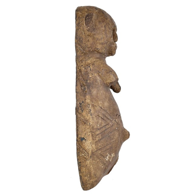 This so-called pregnant belly mask comes from the Makonde people. Women play an important role in Makonde mythology and...