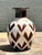 This striking vintage studio pottery vase is a masterful example of 1970s hand-crafted design. Featuring a bulbous, hand-...