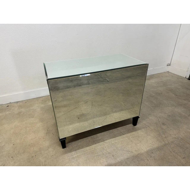 Beautiful custom mirrored chest from the Grace Home Collection. Chest features hand beveled mirror and polished nickel...