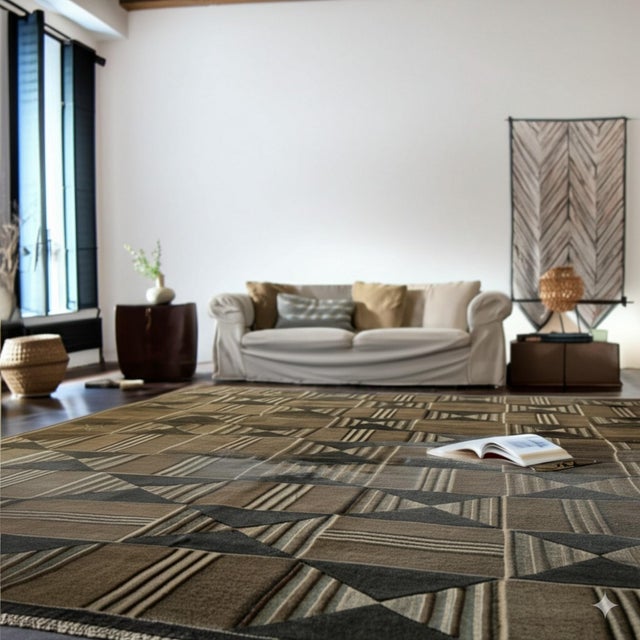 Sumptuous Giselle Brown Hand Knotted Wool Rug, Country of Origin: China. This striking piece presents a masterful study in...