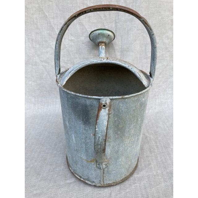Charming vintage galvanized watering can with a large handle and copper spout. Stamped 1 1/2, RD 851094. Made by Beldray,...