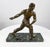 A handsome, large bronze sculpture by Alexandre Kelety, with a harmonious green patina, depicting an athletic man sowing...