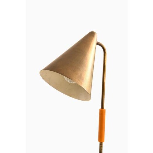 This table lamp, produced in denmark during the 1950s, embodies the essential qualities of scandinavian mid-century design...