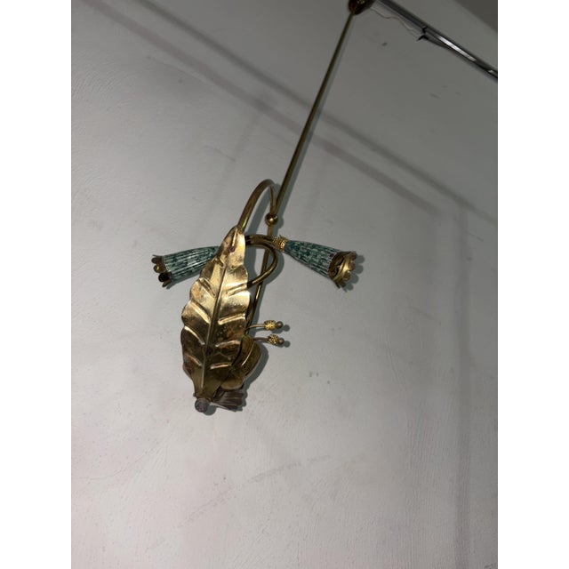 Vintage brass chandelier from the 1920s. Chandelier height 1 m, width 25 cm. Up to 250V (Europe/UK Standard).The wiring of...