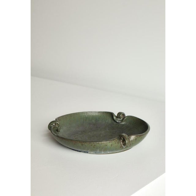 An exceptional and sculptural Art Deco stoneware bowl model no. 206 by Danish ceramicist Arne Bang, executed in the 1930s....