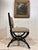 A rare and highly decorative example of 19th-century design, this fine Aesthetic Movement chair in the manner of Lamb of...