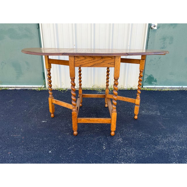 Early 1900's English Oak Barley Twist Oval Gate Leg Table For Sale - Image 6 of 12
