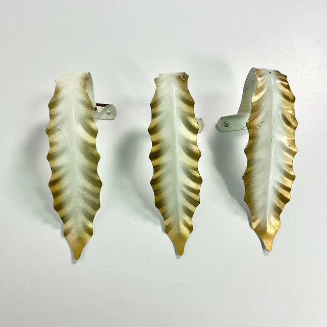 A lovely option to add a vintage accent to a room. These three Italian Roman Empire Tole curtain tiebacks are acanthus...