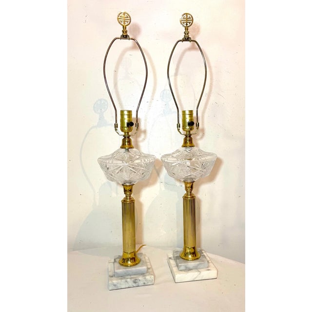 Up for sale is a very nice quality pair of vintage brass and cut crystal electric parlor table lamps. The are made with...