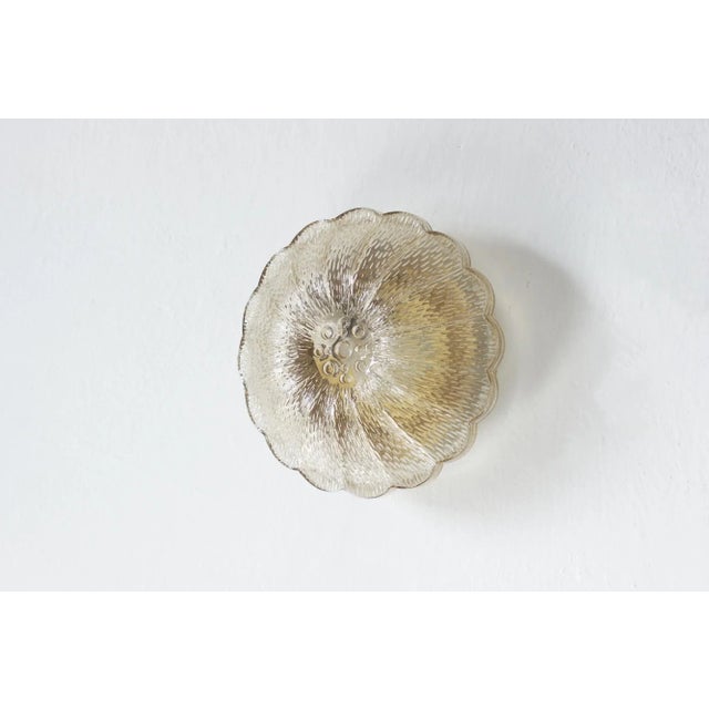 This unique ceiling lamp combines romantic styling with the elegance of vintage glass. Its shade is shaped like a delicate...